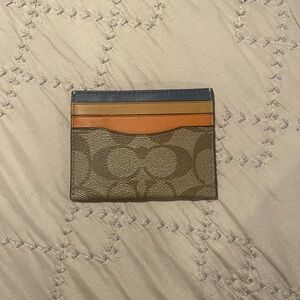 Multi color like new Coach card wallet.